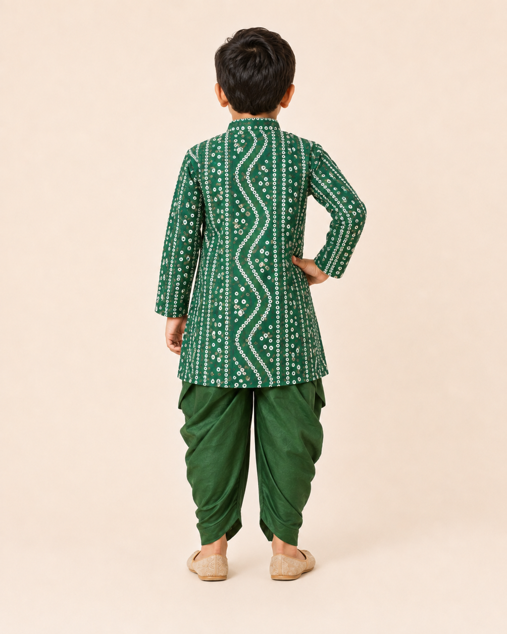 Back view of the boys green bandhani print kurta and draped dhoti set