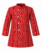 Red bandhani print kurta laid flat showing the white bandhej motifs and mandarin collar